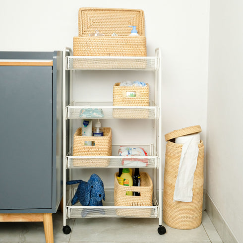 Different sized storage baskets on a shelf